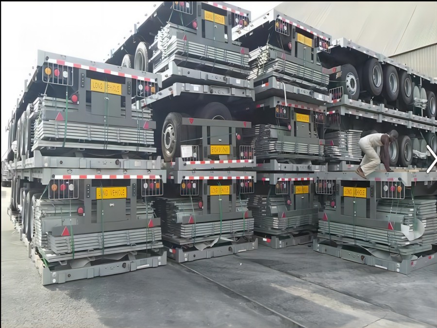 24 units flatbed trailer loaded on the ship for the Ivory coast Customer